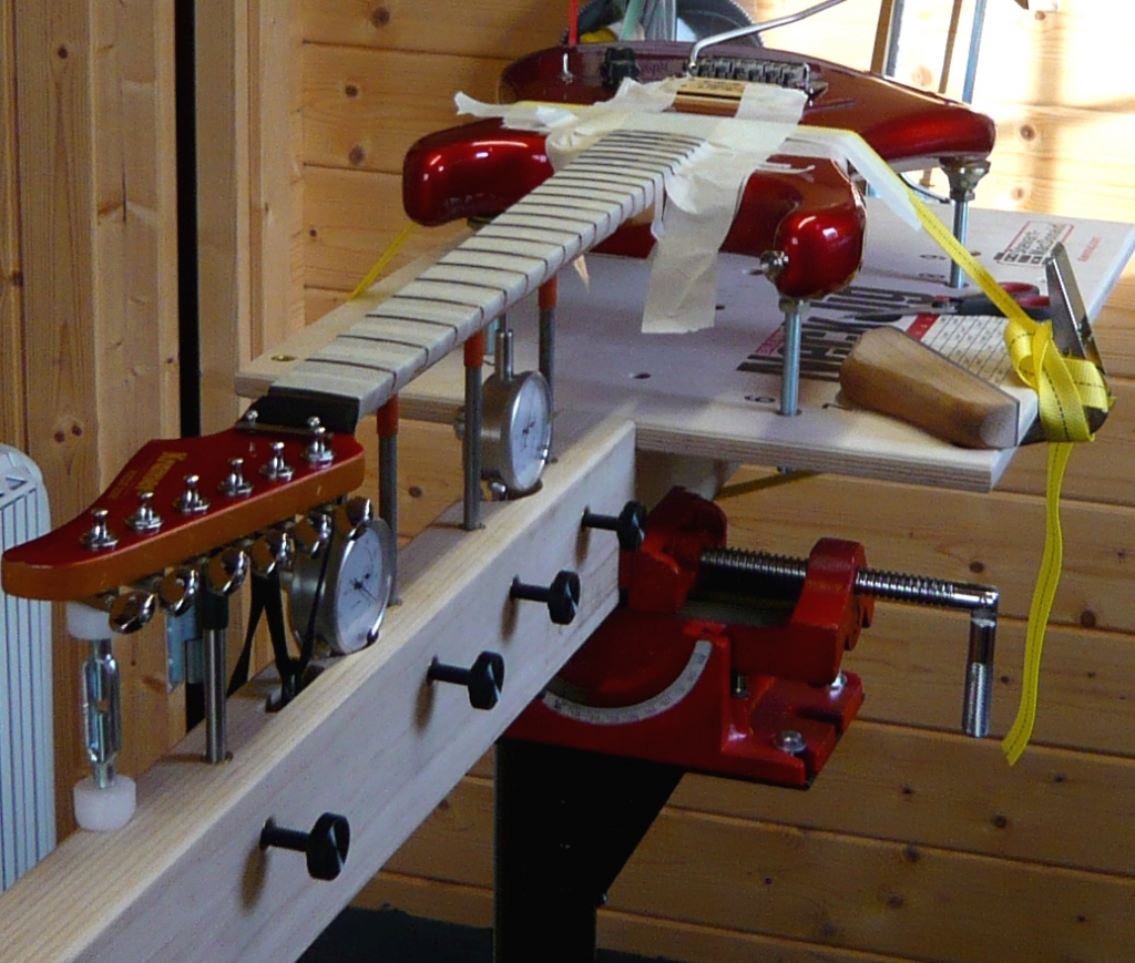 Kramer guitar being fret dressed on the Stewmac neck jig