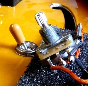 Pickups, electronic repairs & modifications: new control pot being installed on Gibson 335