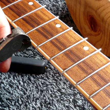 Cutting fret ends: