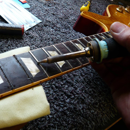 Removing frets using heat: